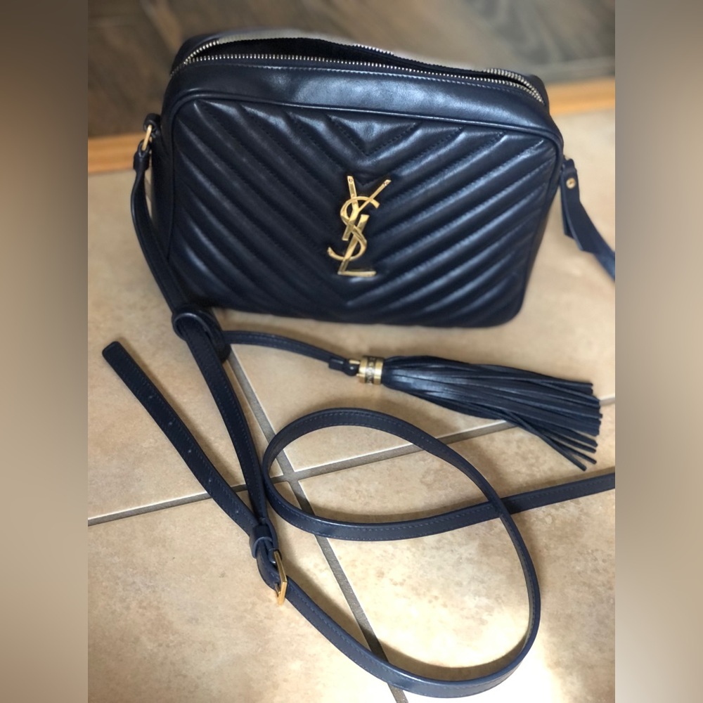 Navy YSL Lou camera bag purse.